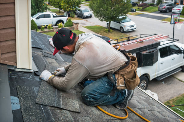 Professional Roof Replacement technician working in Medfield, MA